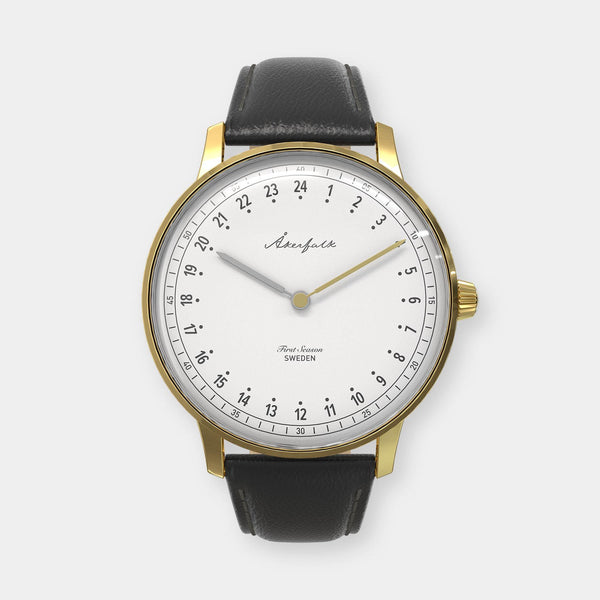 24-hour watch with gold case and black leather strap