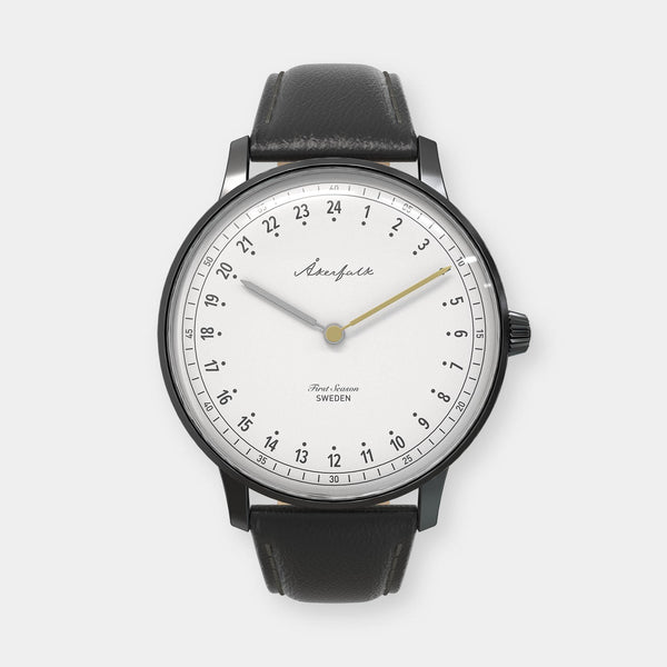 24-hour watch with matte black case and black leather strap