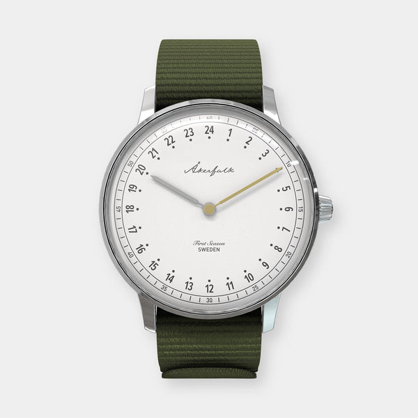 24-hour watch with silver case and green NATO strap