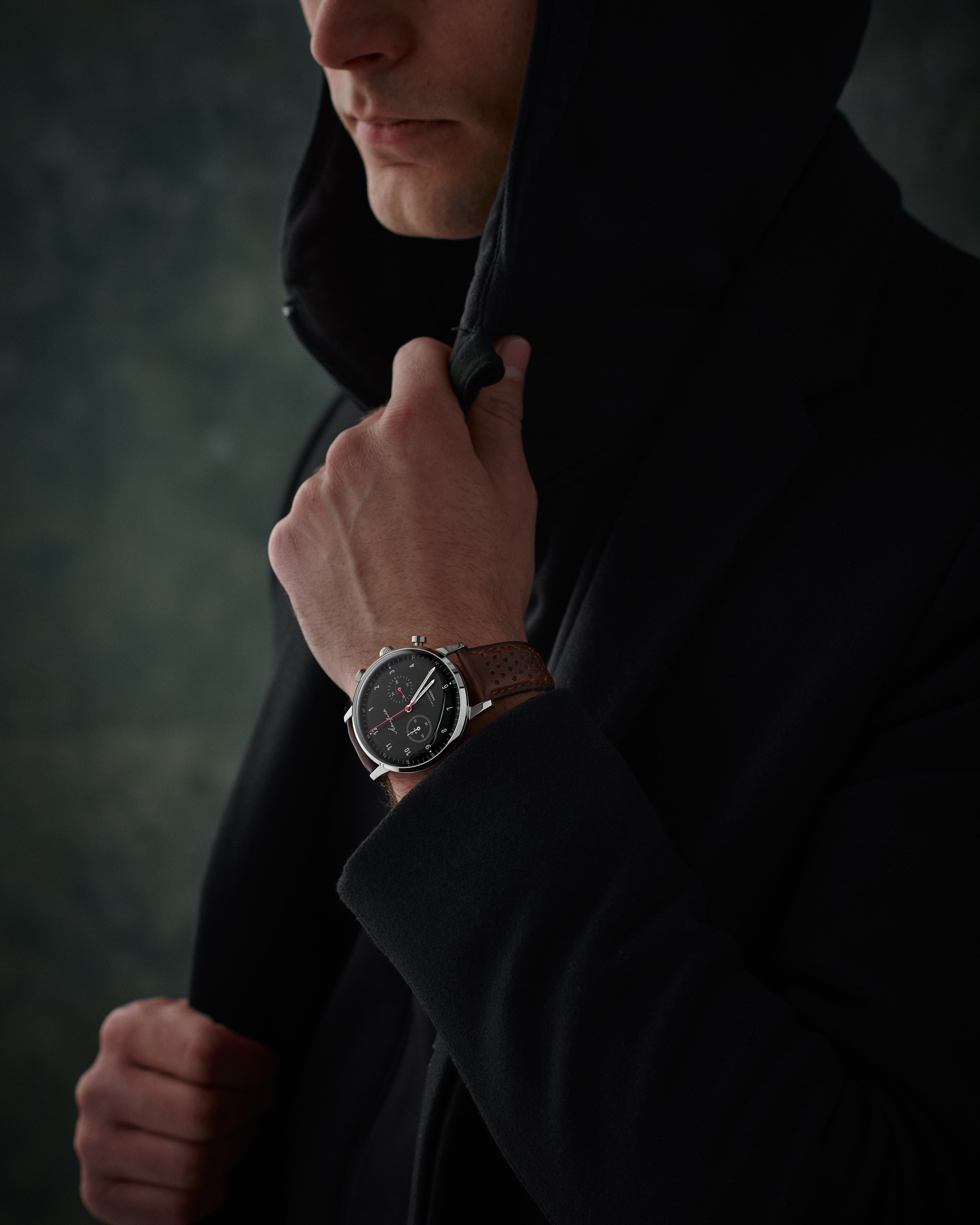 24-hour watch with silver case and brown leather strap