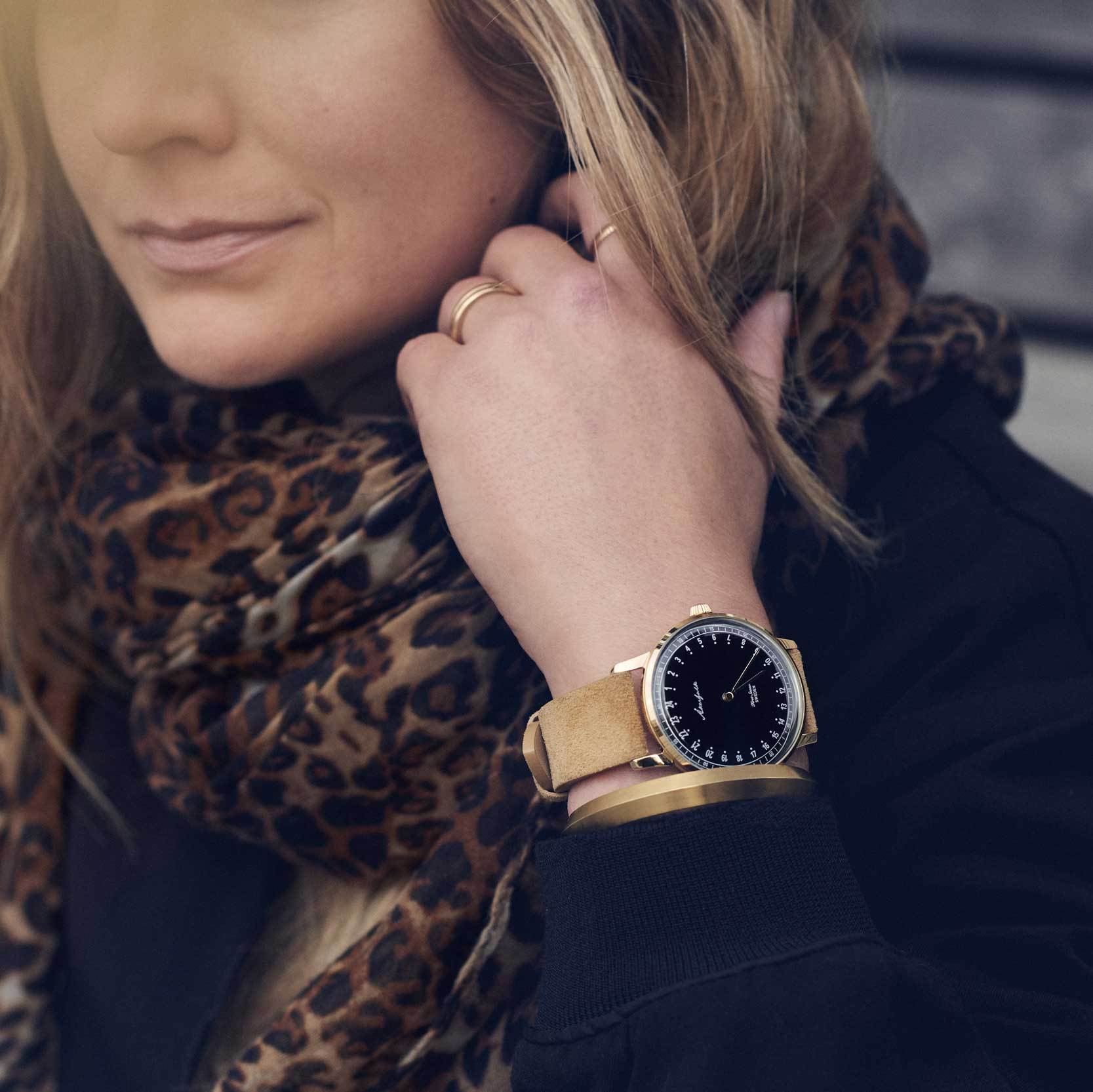 24-hour watch with silver case and light brown mocha strap